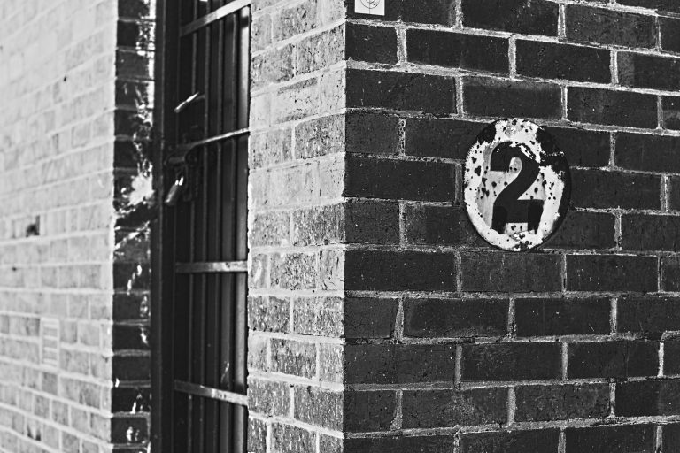 Number 2 on outside of old brick building